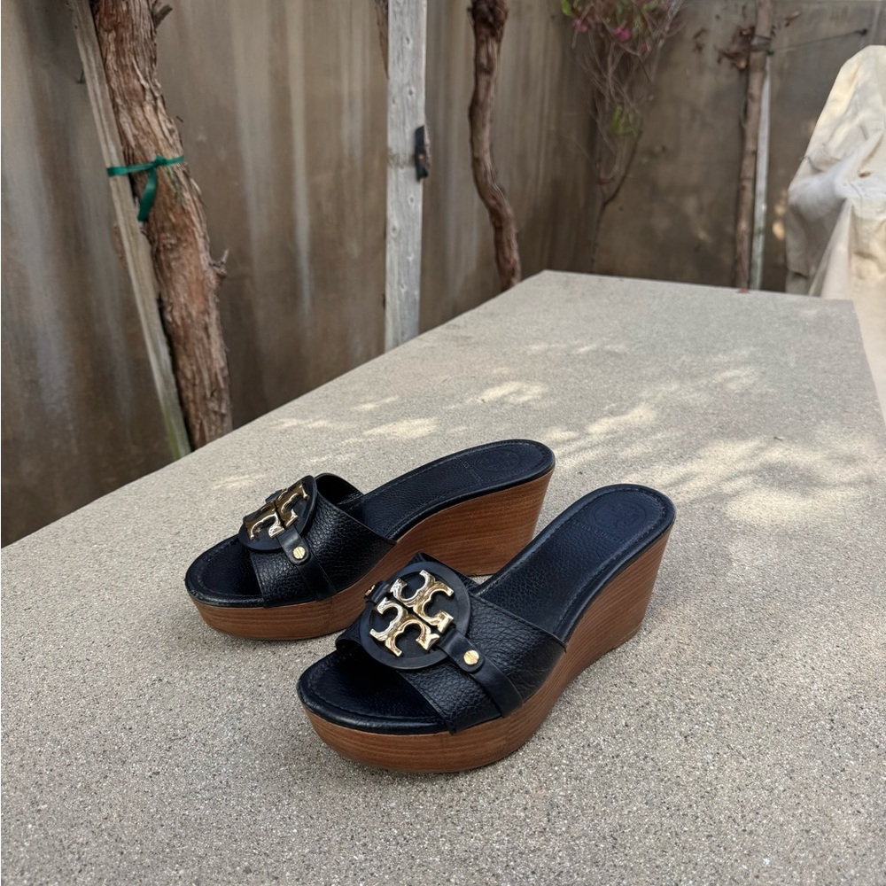 Tory Burch Black and Gold Wedges with Elegant Design